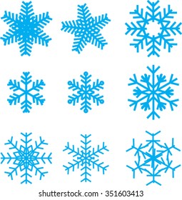 Snow flakes. Set of original stylized snow flakes on the white background. Vector.