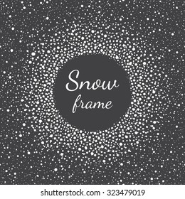 Snow frame with empty space for your text and splash texture. Winter background made of spots or dots of various size. Round shape. New Year, Christmas black and white abstract template.