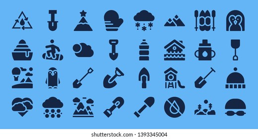 snow icon set. 32 filled snow icons. on blue background style Collection Of - Water, Frozen, Sky, Storm, Shovel, Snowboard, Penguin, Hail, Peak, Cloudy, Mountains, Mitten, Snow