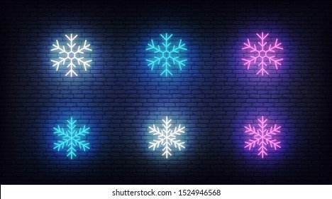 Snow icons neon. Vector glowing neon colorful snowflake icons