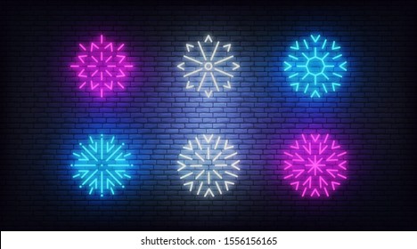 Snow icons neon. Vector glowing neon colorful snowflake icons