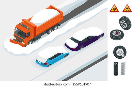 Snow plough truck clearing road after white-out winter snowstorm blizzard for vehicle access. Cars covered in snow on a road during snowfall.