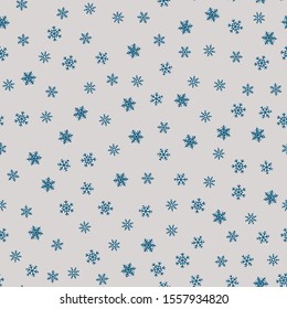 Snow seamless pattern. Elegant Christmas background with small blue snowflakes on gray backdrop. Winter holiday theme vector texture. Stylish repeat design for decor, print, web, gift paper, scrapbook
