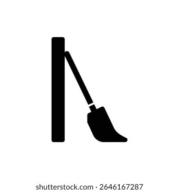 Snow Shovel Against Wall for Winter Clean-up Tools