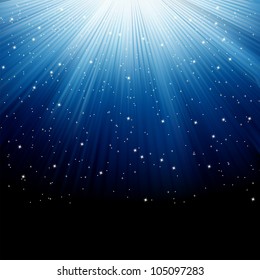 Snow and stars are falling on the background of blue luminous rays. EPS 8 vector file included