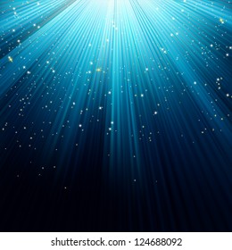 Snow and stars are falling on the background of blue luminous rays. EPS 8 vector file included