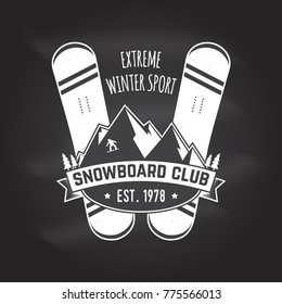 Snowboard Club. Vector illustration. Concept for shirt , print, stamp or tee. Vintage typography design with snowboard and helmet silhouette. Extreme winter sport. Chalk drawing on a blackboard.