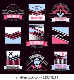 Snowboard and mountains emblems. Graphic design for t-shirt.  Color  print on a  black background