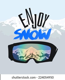 Snowboarding goggles and positive lettering: "Enjoy the snow"