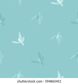 Snowdrop blossoms on light green - vector background