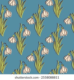 Snowdrops flower on blue background seamless pattern in flat style. Floral print for spring design.