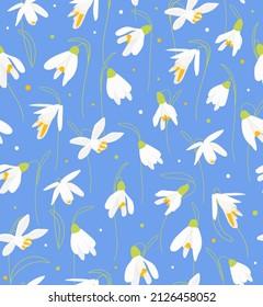 Snowdrops flower vector seamless pattern on blue background. Spring botanical flat illustration for Wedding Invitation, packaging, Fabric, Wallpaper, Print, template