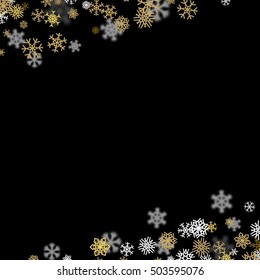 Snowfall background with golden snowflakes blurred in perspective