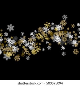 Snowfall background with golden snowflakes blurred in perspective