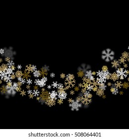 Snowfall background with golden snowflakes blurred in perspective