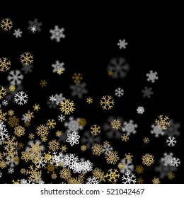 Snowfall background with golden snowflakes blurred in perspective