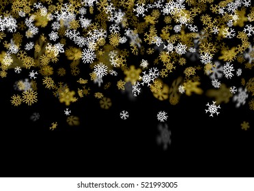 Snowfall background with golden snowflakes blurred in perspective