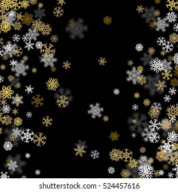Schneefallhintergrund mit goldenen Schneeflocken unscharf.