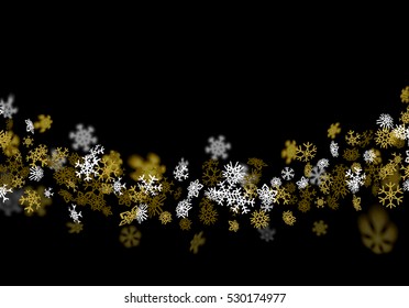 Snowfall background with golden snowflakes blurred in perspective