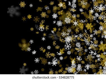 Snowfall background with golden snowflakes blurred in perspective.