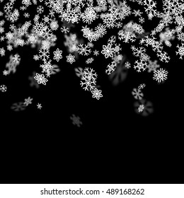 Snowfall background with snowflakes blurred in perspective