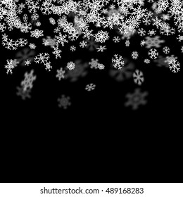 Snowfall background with snowflakes blurred in perspective