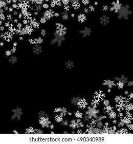 Snowfall background with snowflakes blurred in perspective