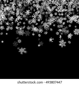 Snowfall background with snowflakes blurred in perspective