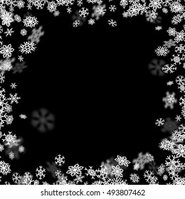 Snowfall background with snowflakes blurred in perspective