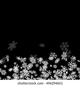 Snowfall background with snowflakes blurred in perspective