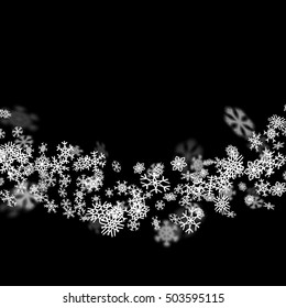 Snowfall background with snowflakes blurred in perspective