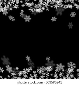 Snowfall background with snowflakes blurred in perspective