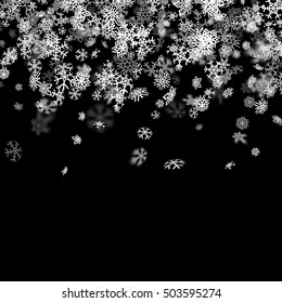 Snowfall background with snowflakes blurred in perspective