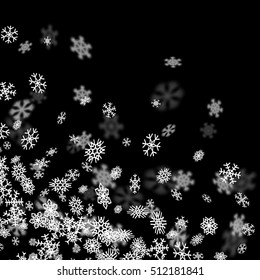 Snowfall background with snowflakes blurred in perspective