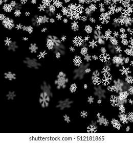 Snowfall background with snowflakes blurred in perspective