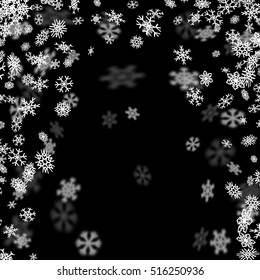 Snowfall background with snowflakes blurred in perspective