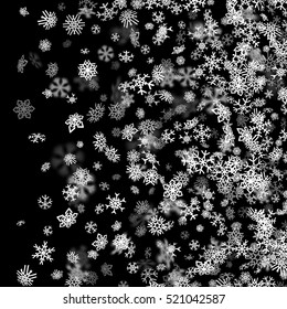 Snowfall background with snowflakes blurred in perspective
