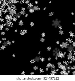 Snowfall background with snowflakes blurred in perspective