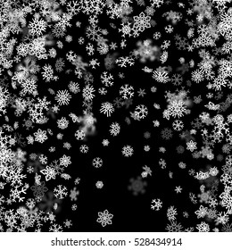 Snowfall background with snowflakes blurred in perspective