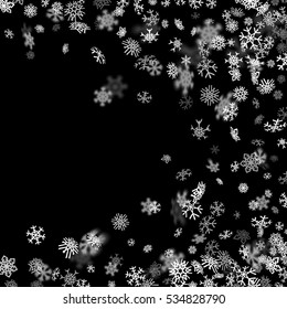 Snowfall background with snowflakes blurred in perspective.