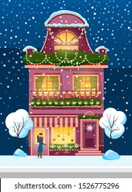 Snowfall in city or town vector. Woman wearing earmuffs and warm clothes standing by home. Building exterior decorated by wreaths and garlands. Wintertime facade of house with wreath flat style