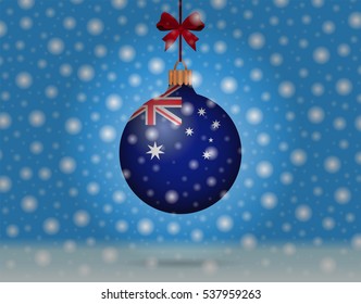 Snowfall and ornament with flag of Australia