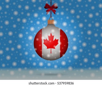 Snowfall and ornament with flag of Canada