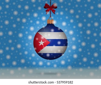 Snowfall and ornament with flag of Cuba