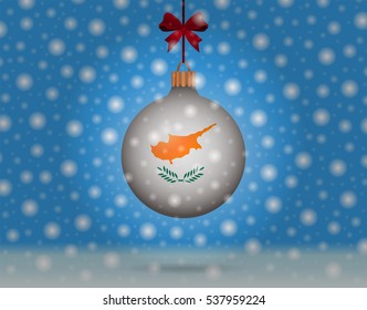 Snowfall and ornament with flag of Cyprus