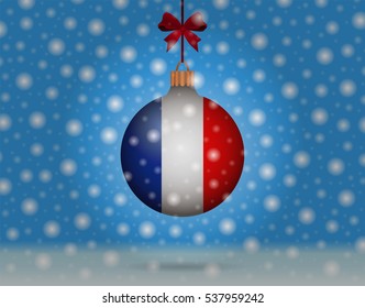 Snowfall and ornament with flag of France