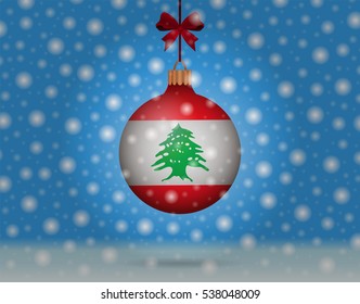 Snowfall and ornament with flag of Lebanon