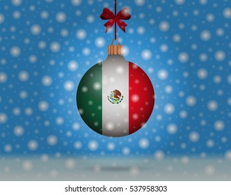 Snowfall and ornament with flag of Mexico