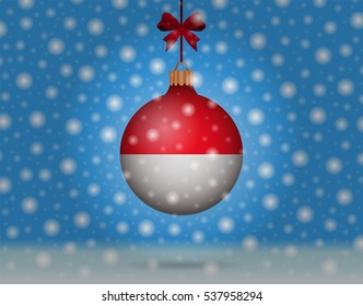 Snowfall and ornament with flag of Monaco