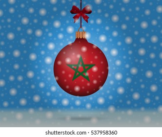 Snowfall and ornament with flag of Morocco